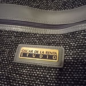 And Oscar de La Renta to brand new bag and another Oscar de la do smaller bag.